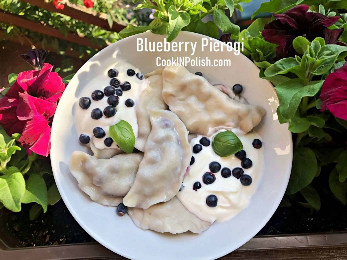 A plate of blueberry pierogi